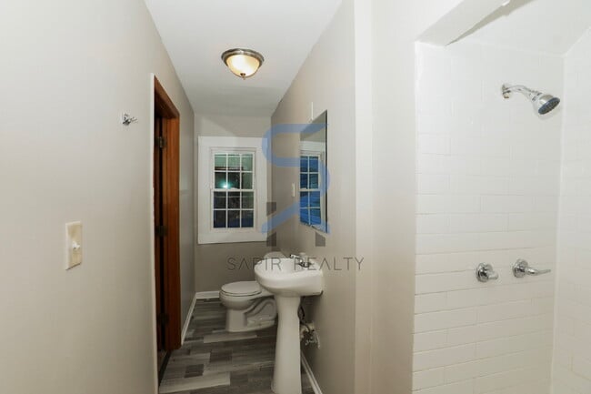 Building Photo - Move in before February 15th and choose your reward: a $250 Amazon Gift Card or a 55" Smart TV!