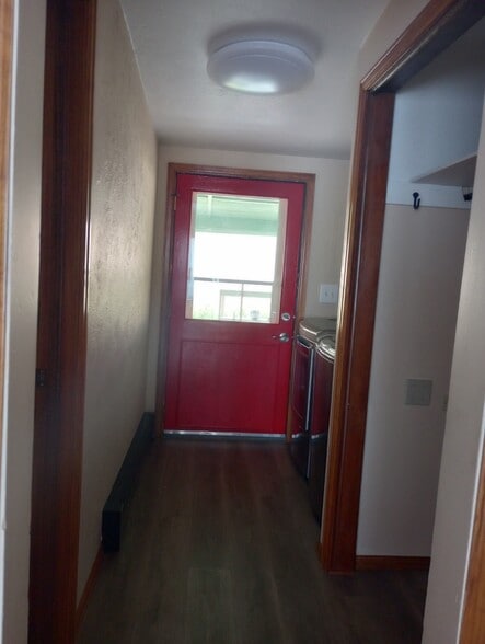 laundry/Pantry room to back porch. - 28057 Knowles Rd