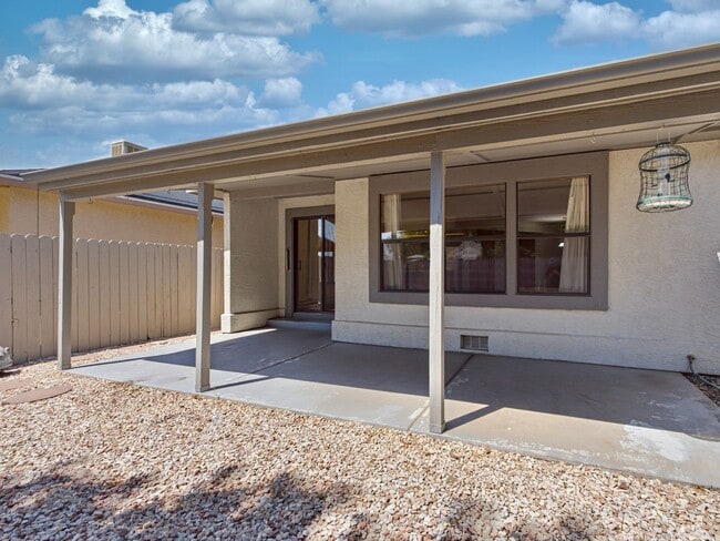 Building Photo - Spacious 2BR Rental with Open Floor Plan & Low-Maintenance yard