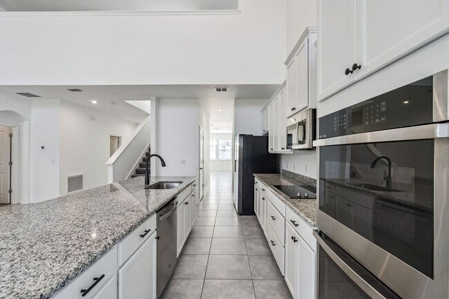 Building Photo - Amazing 5/3.5/2 House in The Reserve at Pine Tree