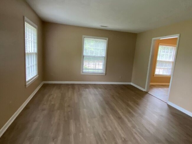Building Photo - 4BR brick home with rocking chair porch, f...