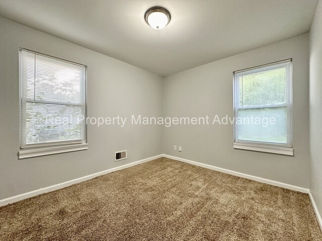 Building Photo - Mid-Century Ranch Boasts 3 Large Bedrooms ...