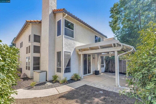 Building Photo - Updated Mediterranean-style home in Renais...