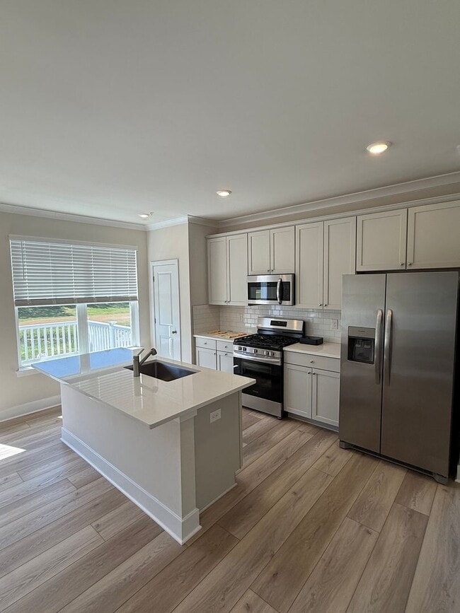 Building Photo - Luxury End-Unit Townhome with Golf Course Views at Tides at River Marsh- Cambridge, MD