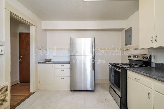 Building Photo - 1301-1311-1311 6th Ave