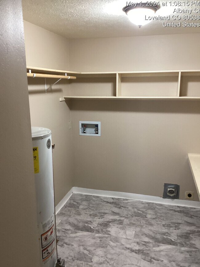 Building Photo - Great 2 Bed, 1 Bath Duplex with Attached Garage in Northern Loveland