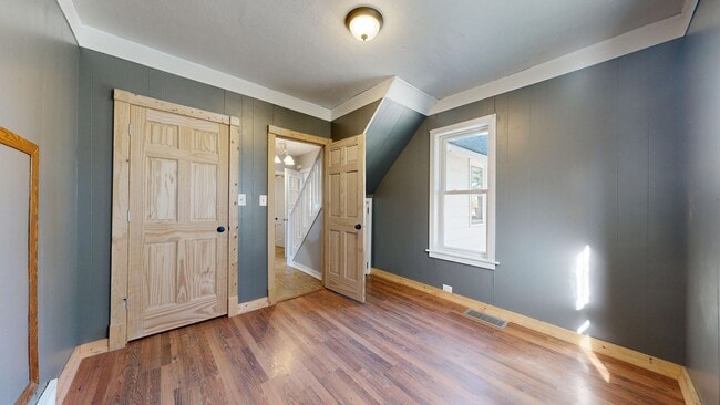 Building Photo - 3- Bedroom, 1- Bath Home with a 2 Car Gara...