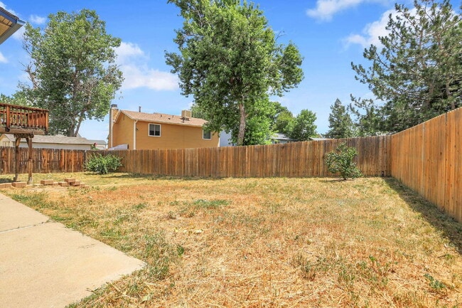 Building Photo - $2,720.95 - 4 bed, 2 bath, located in Aurora with attached Garage and In Unit Washer and Dryer!