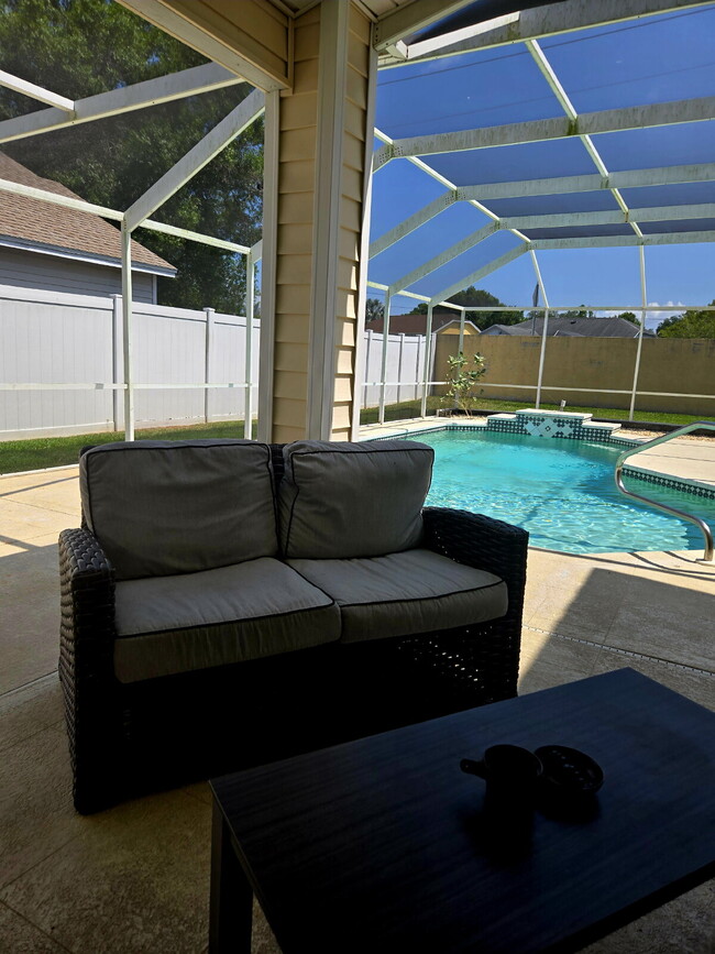 Building Photo - This 3/2 pool home is located at beautiful...