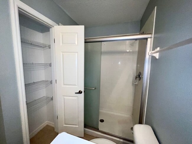 Building Photo - MOVE IN MARCH! Charming 2 Beds 2.5 Bath Townhome! 2 MASTER SUITES! Attached one car garage!! Extr...