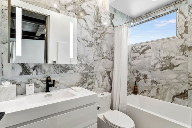 Building Photo - Perfect Beach Getaway! Hotel-like Studio Home in Secured High-rise Building With Breathtaking Bay...