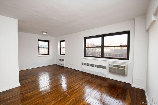 Building Photo - 94-30-94-58 58th Ave