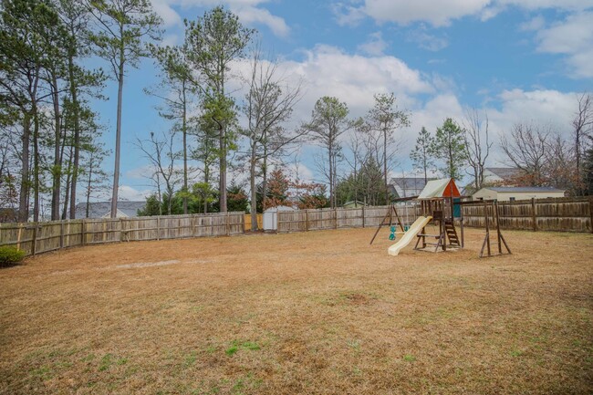 Building Photo - "Charming 4-Bedroom Home with Granite Coun...