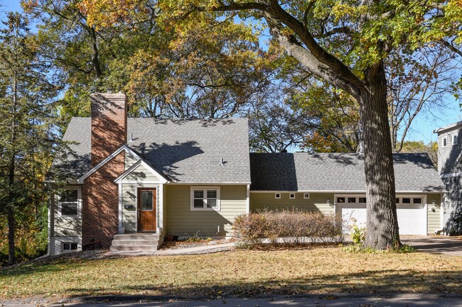 Home is located just a short stroll away from downtown Wayzata on a quaint tree lined street - 207 Benton Ave