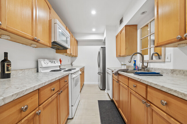 Kitchen is fully equipped with all new stainless steel appliances including a large fridge and stove - 3091 Colonial Way