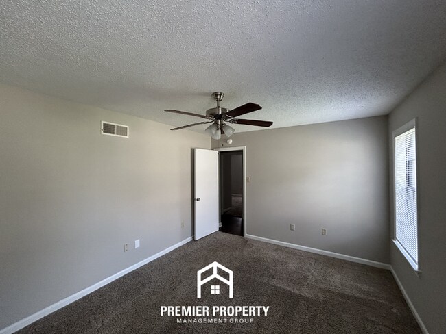 Building Photo - Stunning 3BR/2BA Near Southwind | 2,079 Sq Ft, Built-Ins, Fireplace & Covered Patio