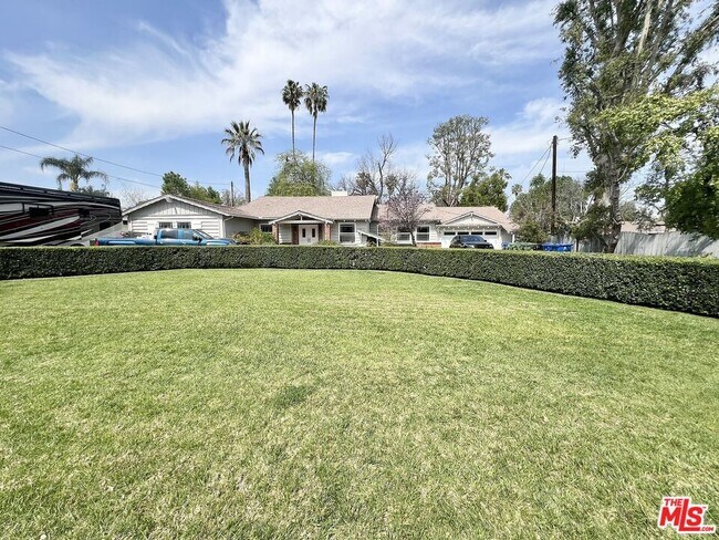 Building Photo - 22839 Oxnard St