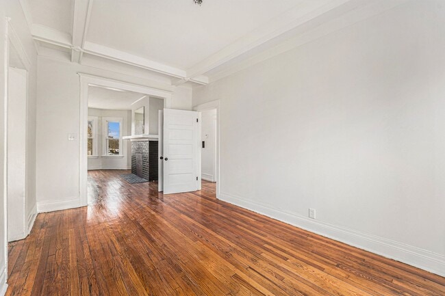 Building Photo - Charming Haven: Dunedin's Six-Family Gem