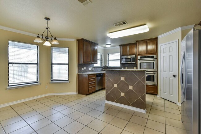 Building Photo - 6905 Deorsam Loop