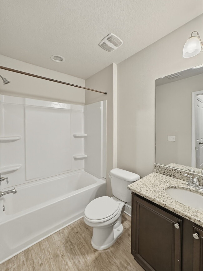 Building Photo - Now Offered at $1,970 – Prime Navarre Location Near Base & Beach