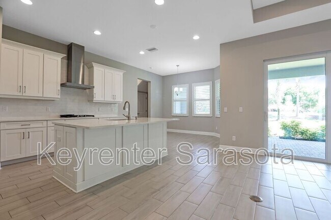 Building Photo - 6133 Lungo Lago Dr