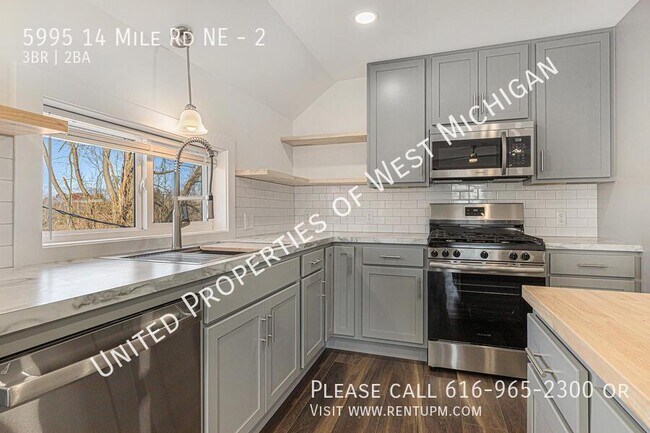 Building Photo - 5995 14 Mile Rd NE