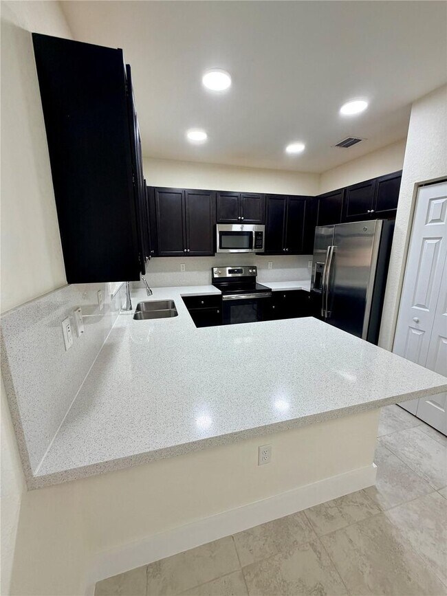 Building Photo - 6561 N Anise Ct