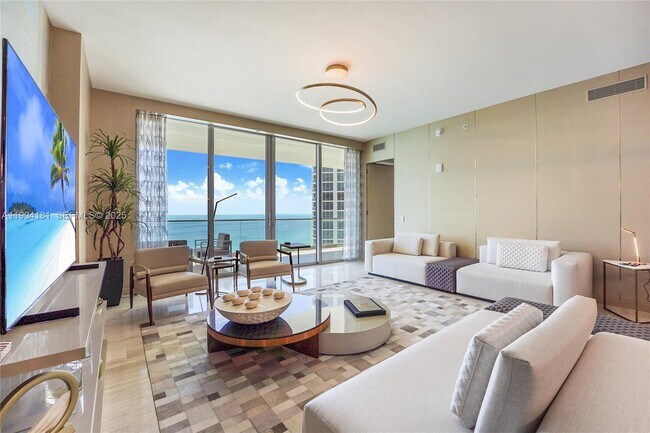 Building Photo - 18975 Collins Ave