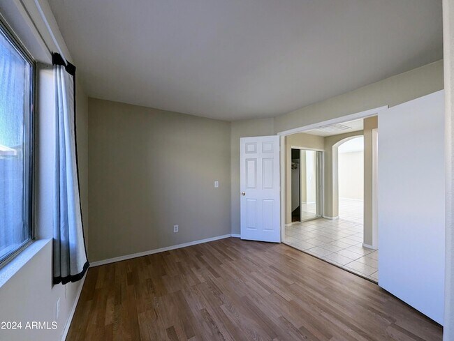 Building Photo - 7059 W Gardenia Ave