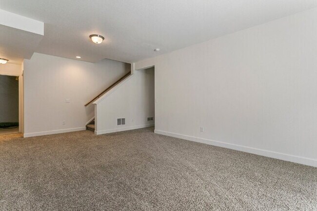 Building Photo - Spacious Banning Lewis Home with Finished ...