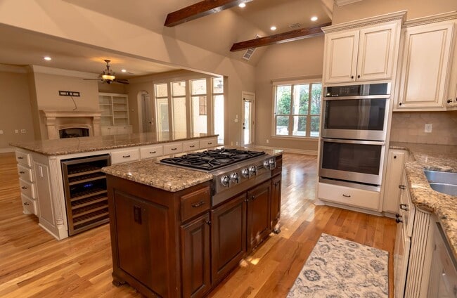 Building Photo - Rare lease opportunity in the exclusive ga...