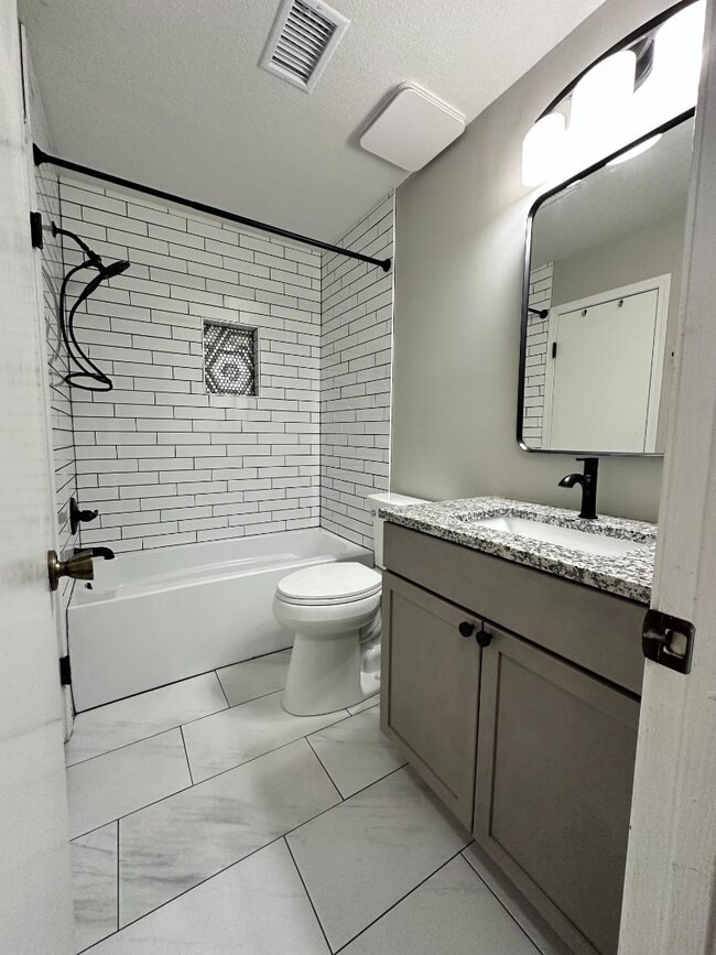 Building Photo - 10235 W 86th Ter