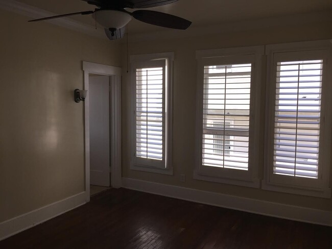 Bedroom facing windows and bathroom - 261 Parke St