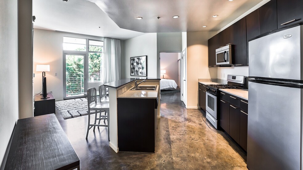 Polished concrete floors in select apartment homes - sunset + vine