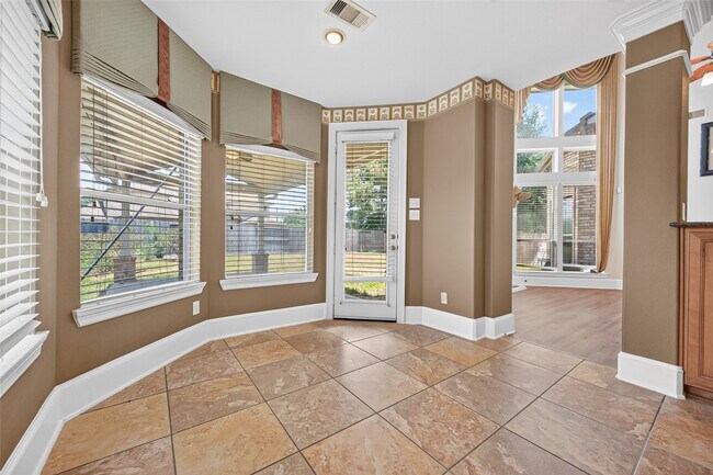 Building Photo - 9735 Lansing Meadows Dr