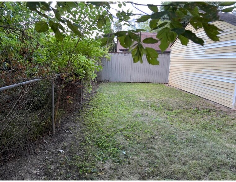 yard behind garage - 8095 Monroe Blvd