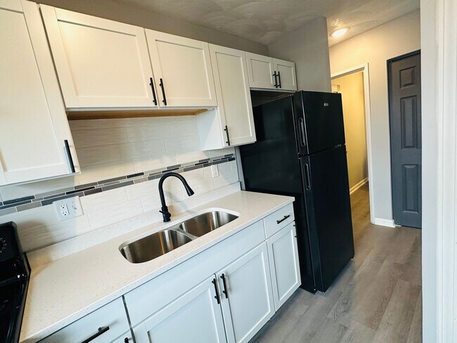 Building Photo - Experience Luxury Living at Park Harrison:...