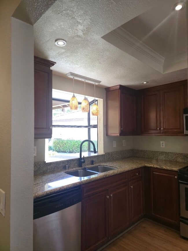 Building Photo - Light-Filled End Unit Condo, 2BD/2.5BA wit...