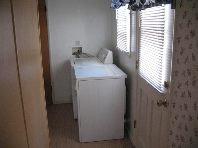 Washer and Dryer (Gas - Save Energy and save energy with clothes line). Miniblinds on windows - 3121 W Wyoming Ave