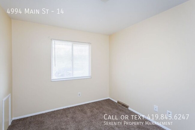 Building Photo - Fall In Love With This Two bedroom Townhom...