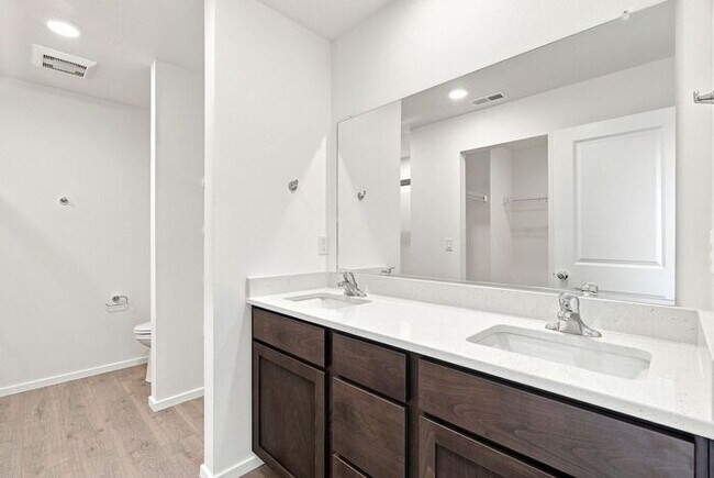 Building Photo - Spacious 5-Bedroom with Loft with 3-Car Garage
