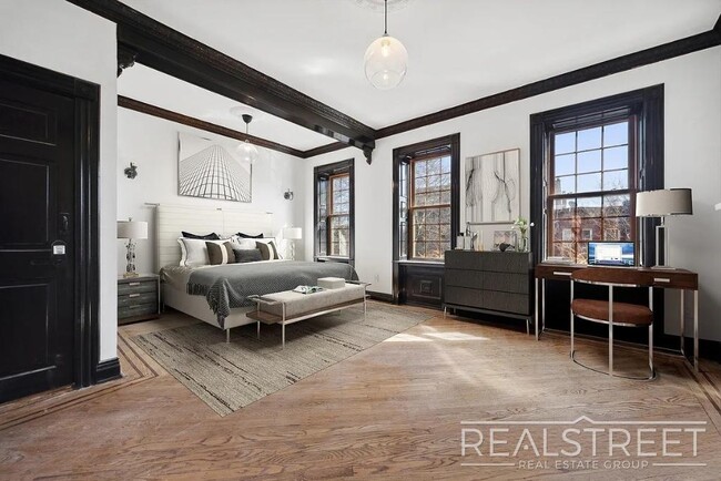 Primary Photo - Timelessly Renovated Historic Triplex with...