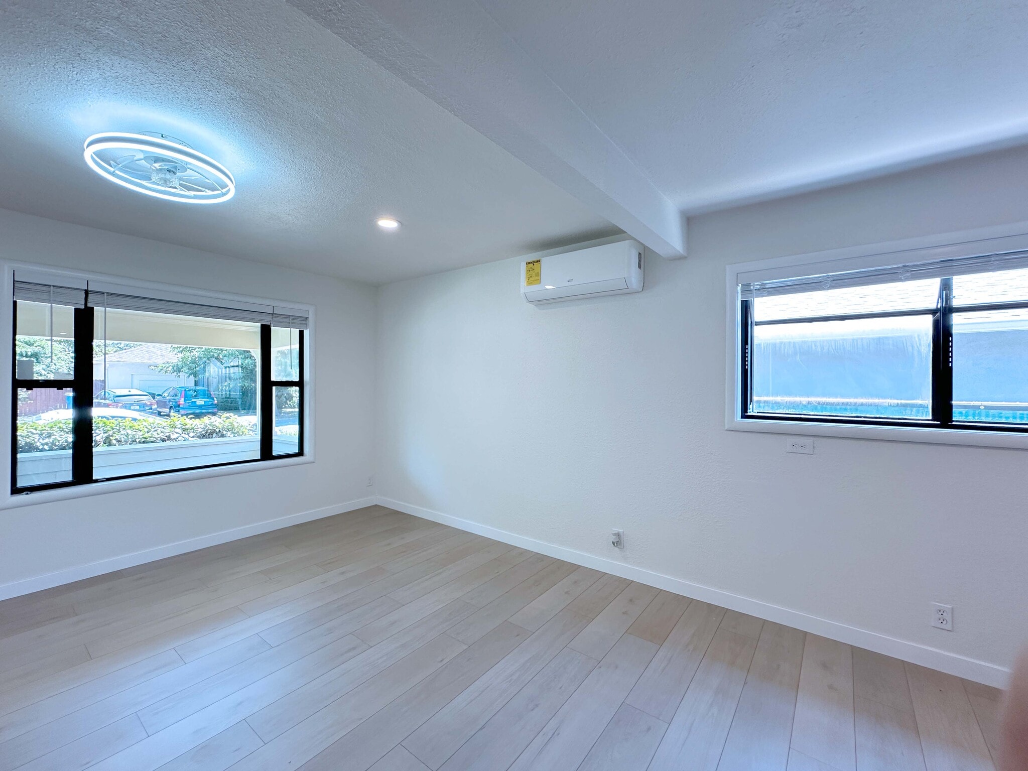 Enjoy comfort and efficiency with beautiful flooring, LED lighting, ceiling fan, and a new heat pump - 4570 58th St