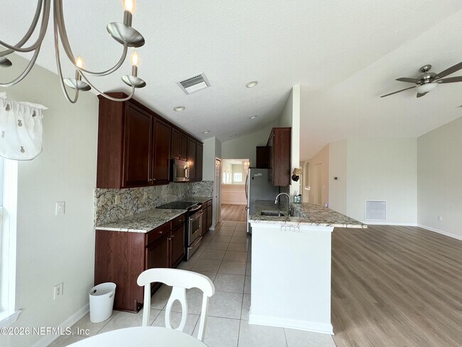 Building Photo - 6600 White Blossom Cir