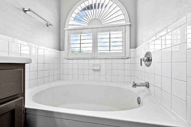 Building Photo - A Waterfall Shower, a Sunroom, and a Story Worth Coming Home To