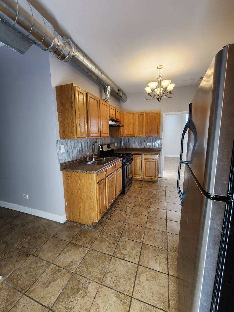 Building Photo - 1451 N Hamlin Ave