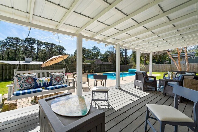 Building Photo - Spacious 4-Bedroom Home with Pool, Two Pri...