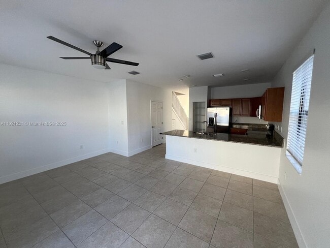 Building Photo - 9399 W 33rd Ln