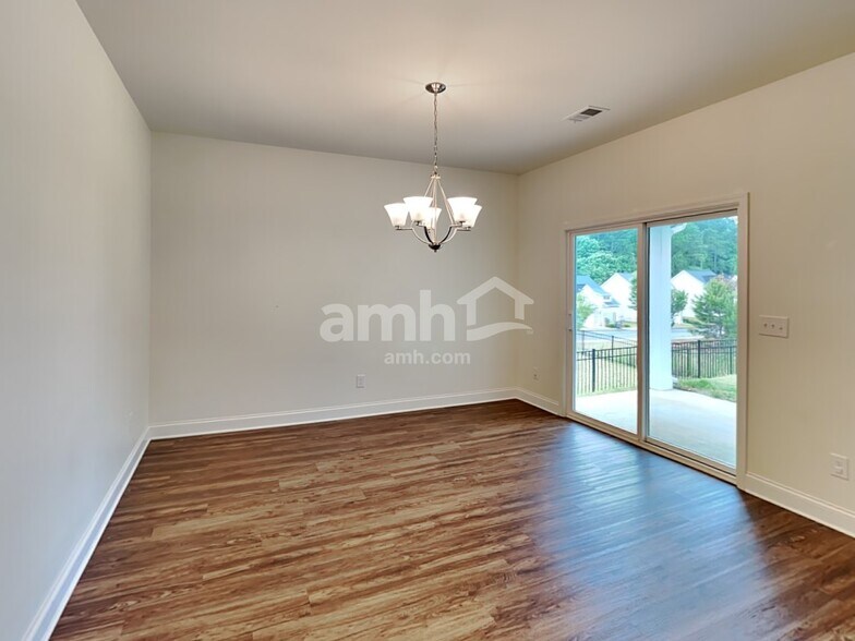 Building Photo - 7077 Creeksong Dr