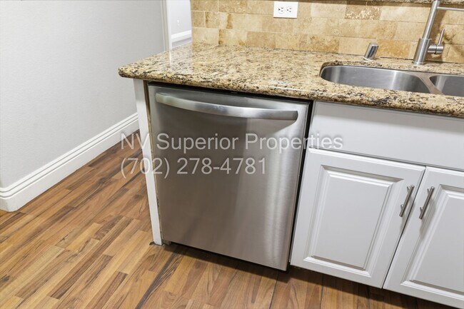 Building Photo - SW!!! 2 Bedroom Condo 1st Floor!! 2 Garage!! Gated!! Community Pool!! Fitness Room!! 2 Primary Be...